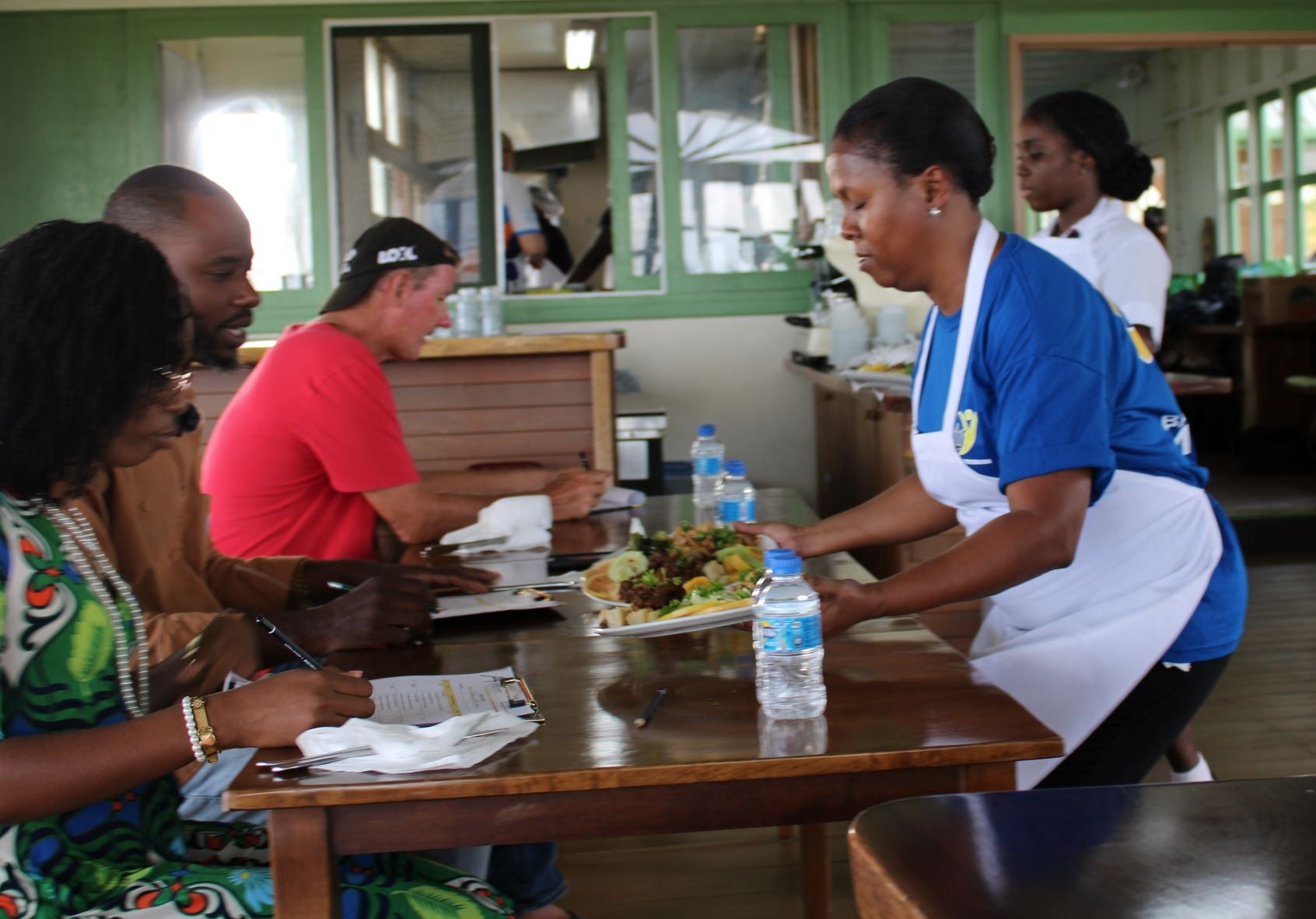 Minister Browne presenting her meal to the judges