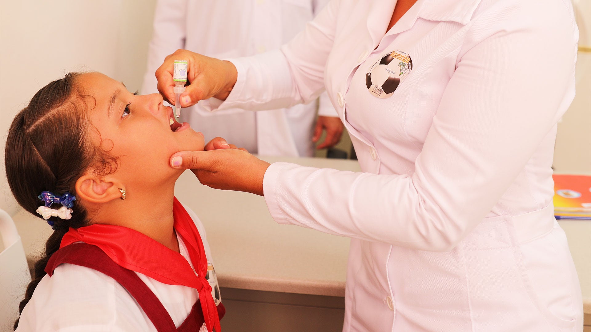 Child getting polio vaccine