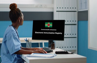 Health worker using a computer