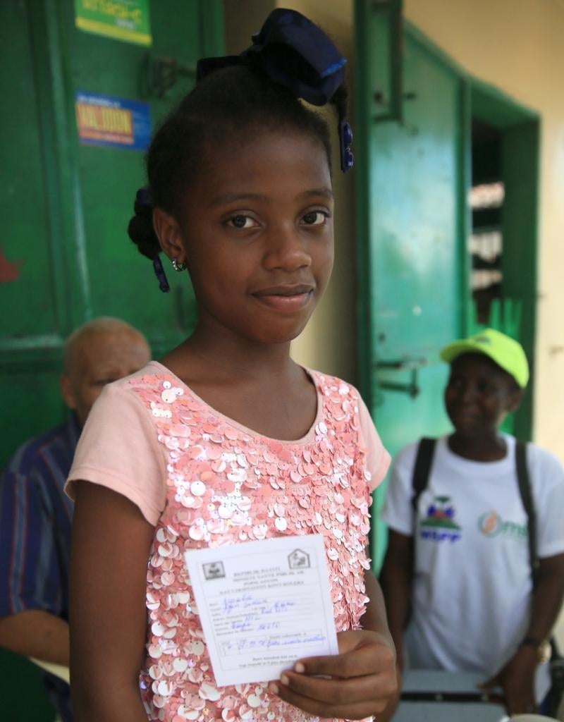 Amalia Jean Simon with her vaccination certificate