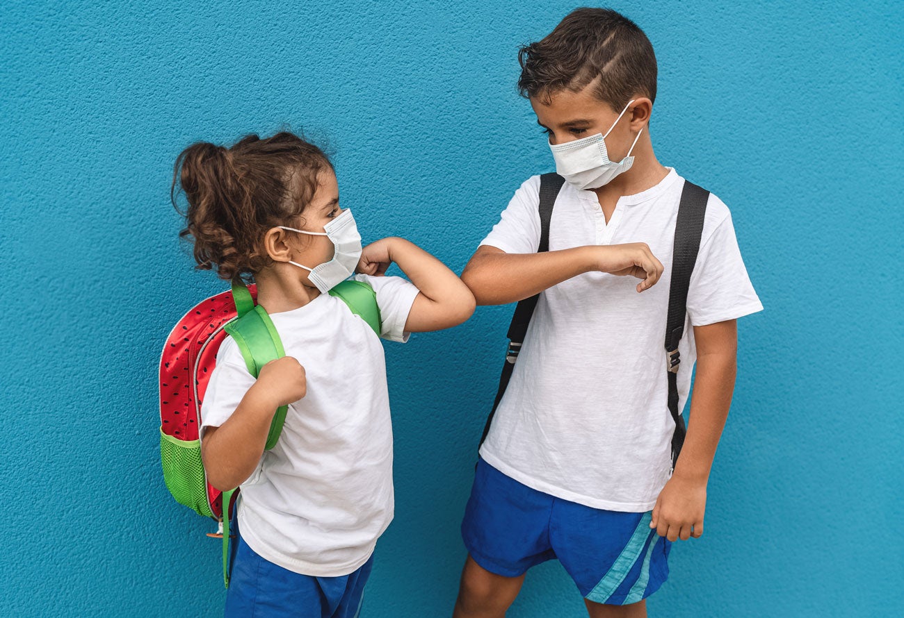 School age children wearing masks