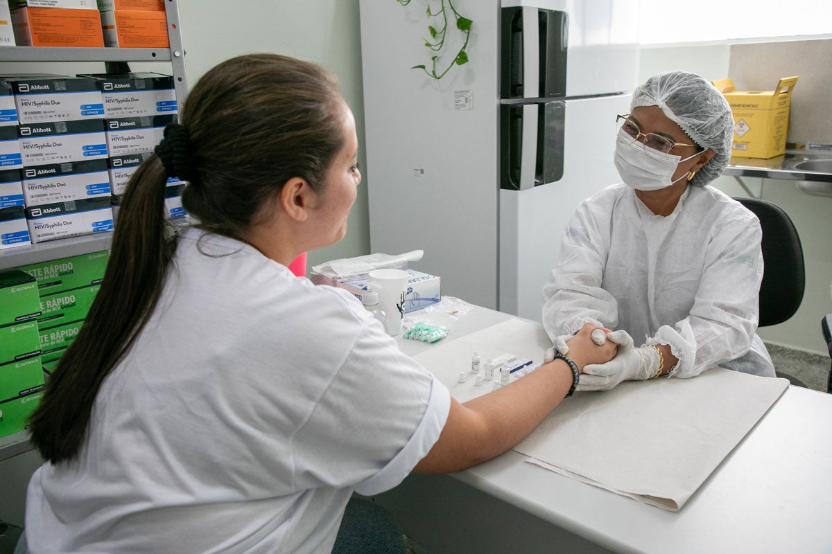 Patient interacting with health worker