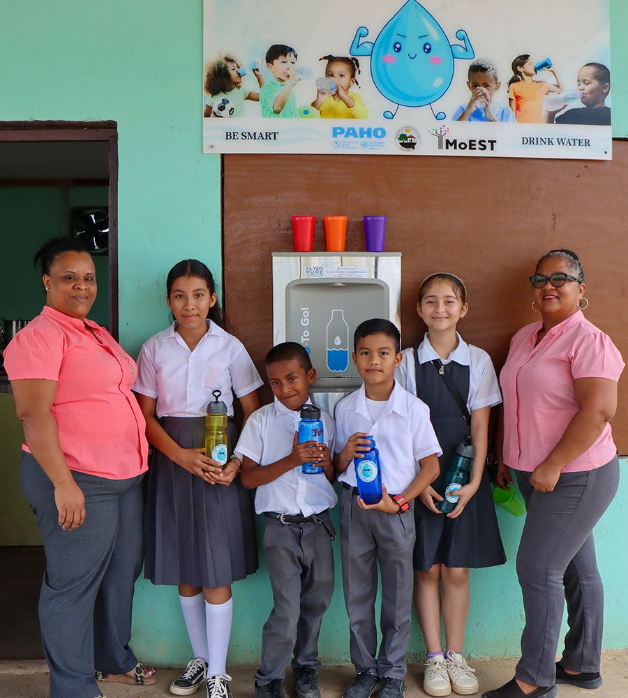 students and teachers posing