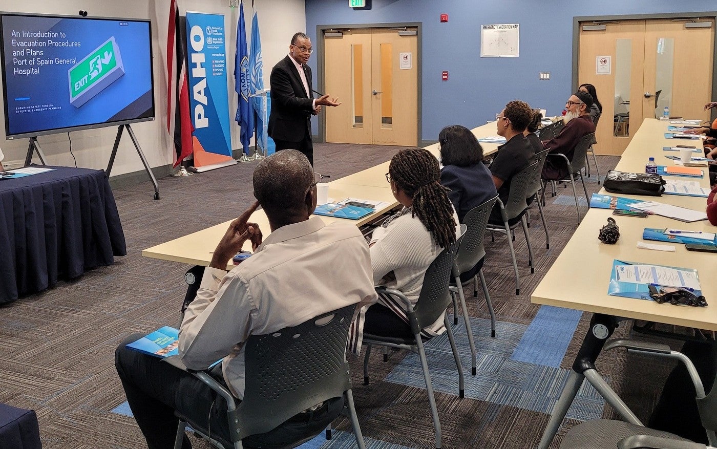 Facilitator Mr. Earl Hernandez makes a presentation to workshop participants from the  Port of Spain General  Hospital.