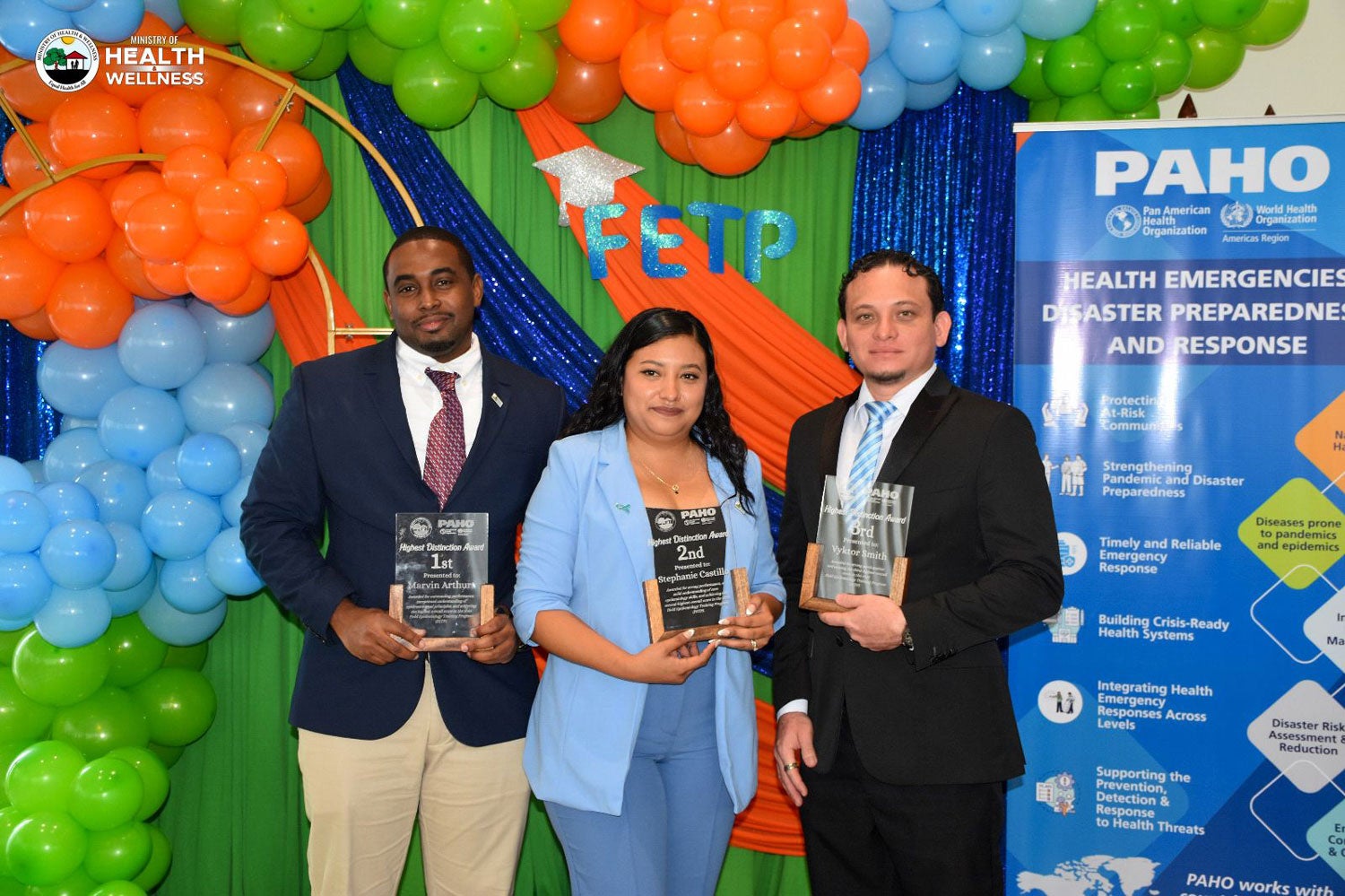 Photo of the top three graduates of the FETP in Belize. 