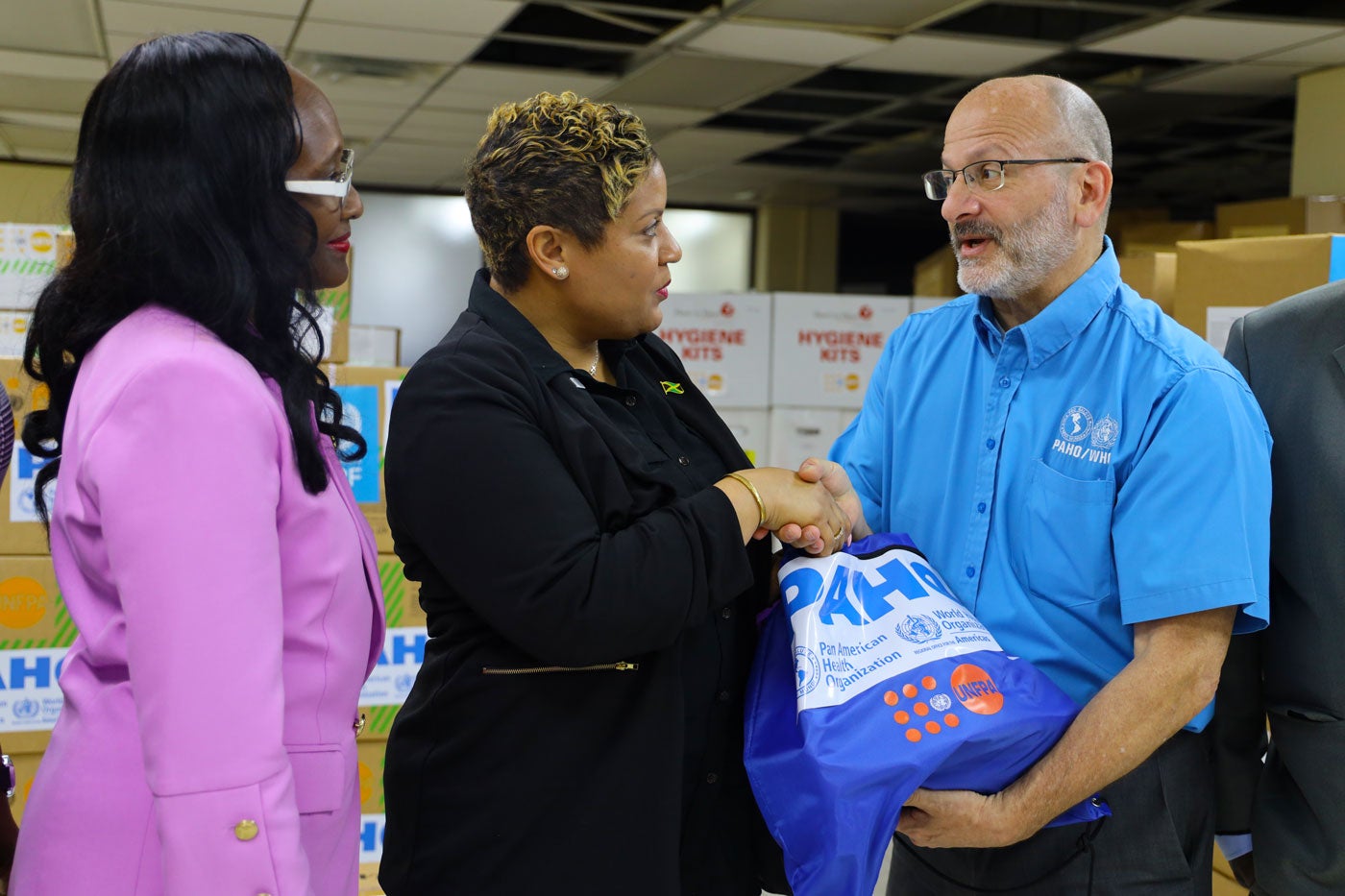 Handover of dignity kit to the Hon. Krystal Lee