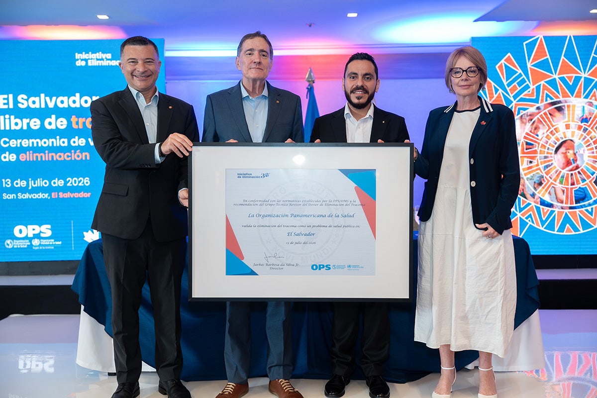 award certificate held up by representatives