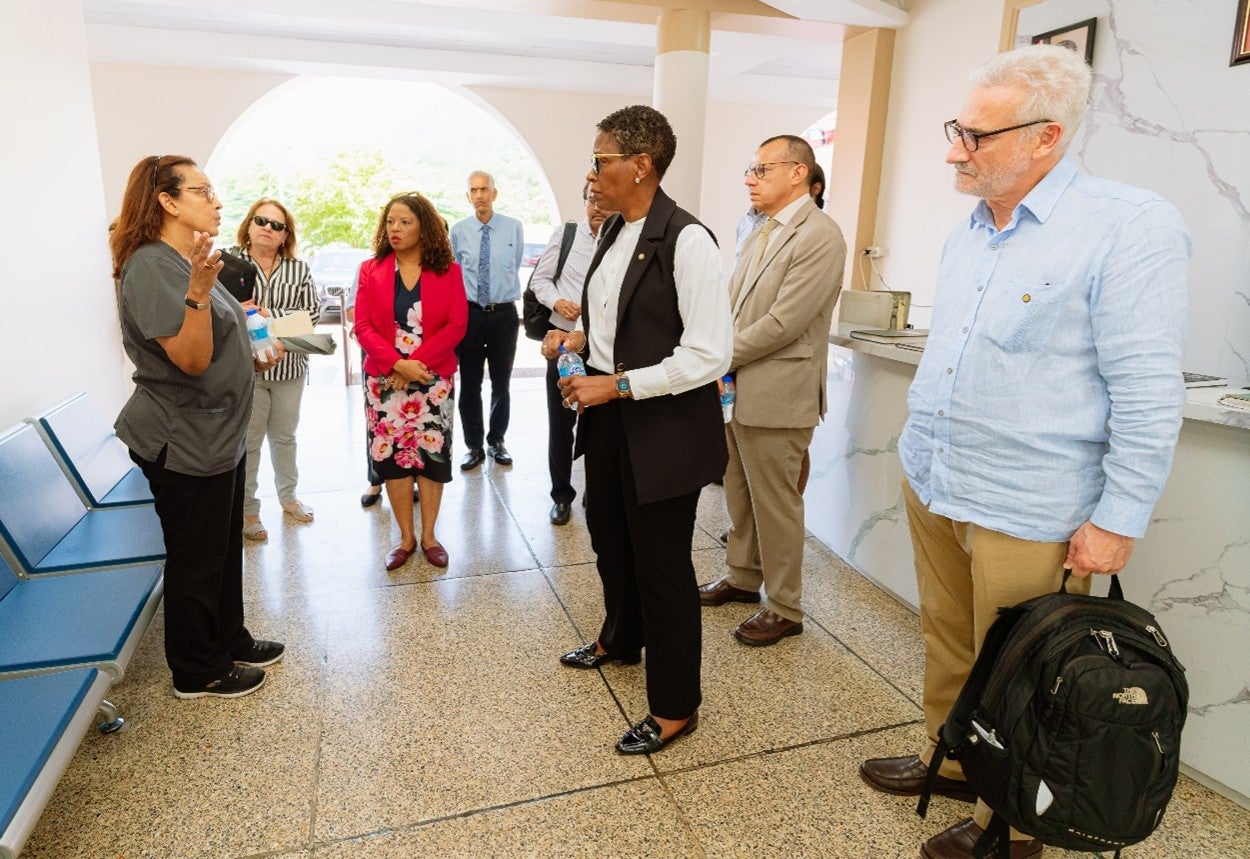 Dr. Candis Gomez-Akan, Thoracic Medical Director at Caura Hospital leads the team on the tour of the facility