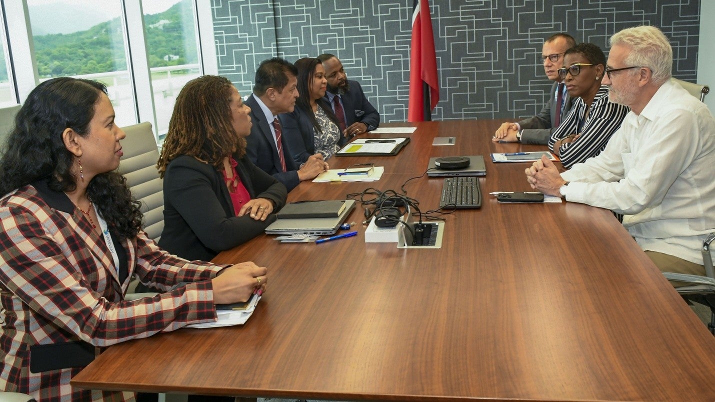 (Right) Dr. Gabriel Vivas Francesconi, Dr. Rhonda Sealey-Thomas and Dr. Sylvain Aldighieri meet with (Centre Left) the Honourable Dr. Lackram Bodoe, Minister of Health and executives of the Ministry of Heath 