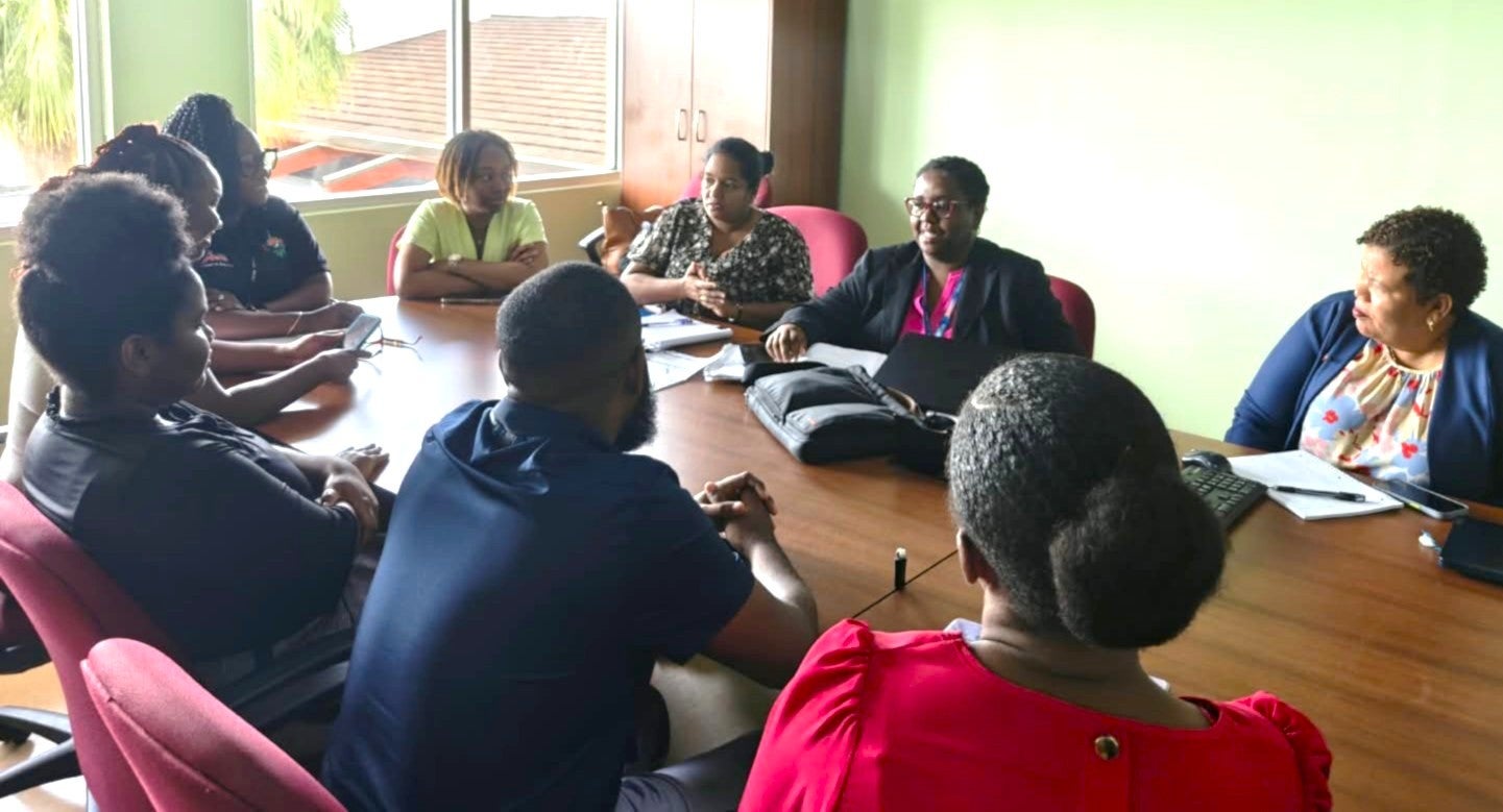 Dr. Shellon Bovell, Advisor - Health Systems and Services, PAHO TTO ( Centre) and other members of the assessment team meet with representatives from the Tobago Regional Health Authority