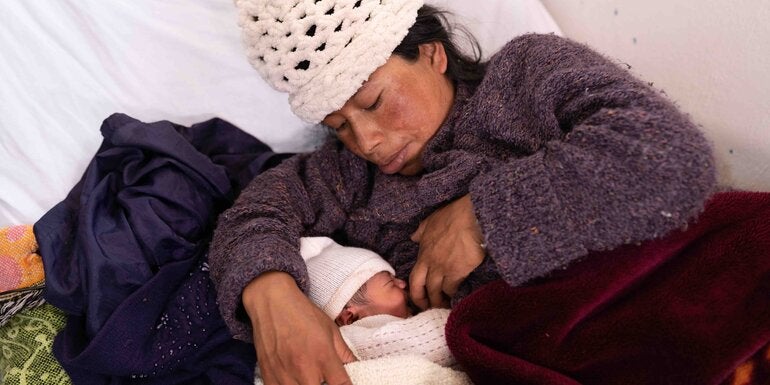 indigenous woman and infant