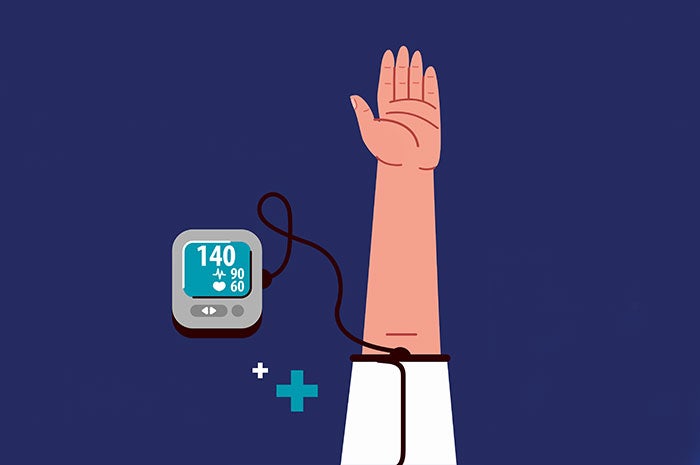 checking blood pressure