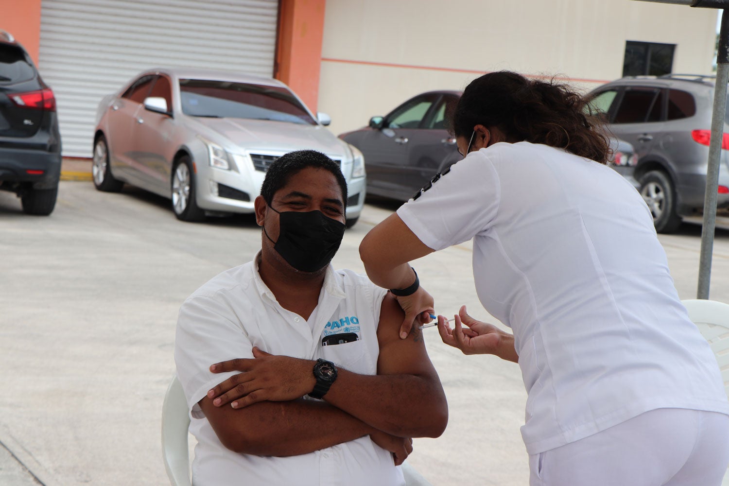 Sergio Guerra receiving flu vaccine at PAHO/WHO Belize Vaccination Drive
