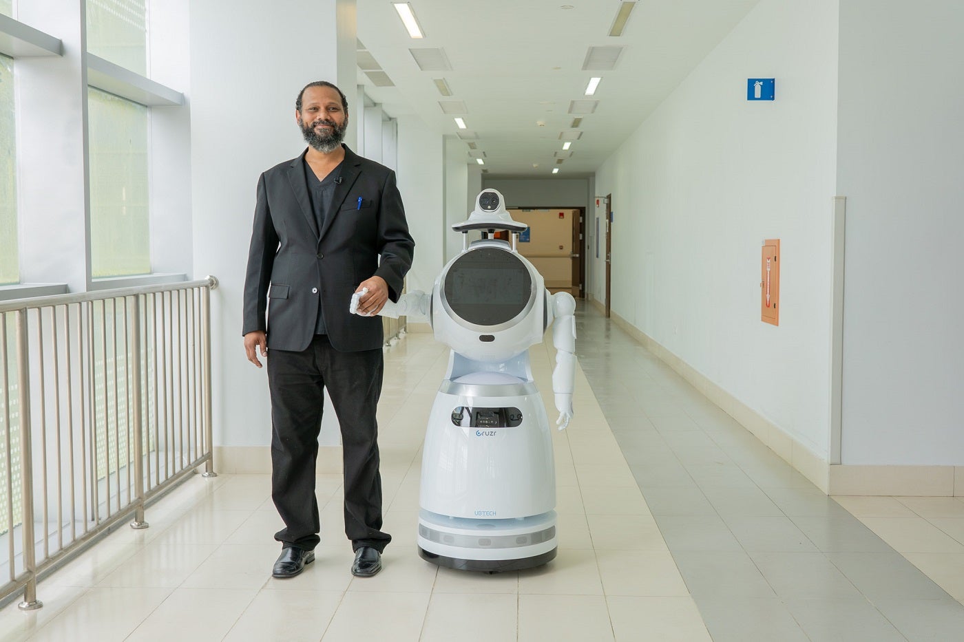 Dr Ravi Lalla – Medical Chief of Staff - Couva Hospital and Multi-training Facility with one of the Health Service Robots