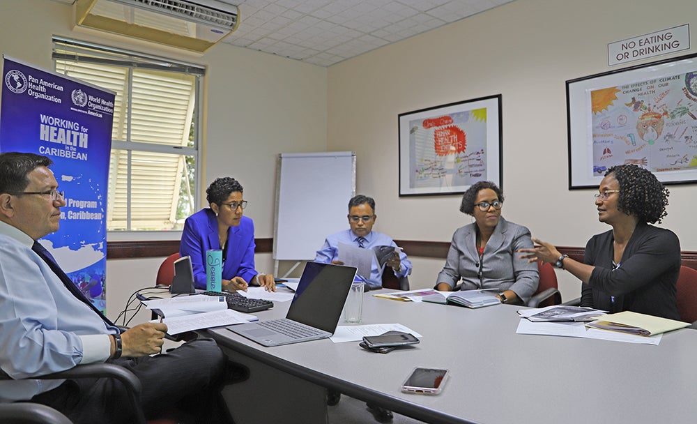 PAHO staff meets UWI staff