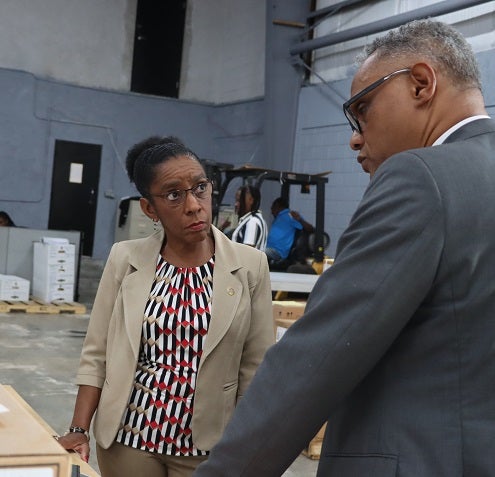 Dr. Eldonna Boisson, PAHO/WHO Country Representative for The Bahamas and Turks and Caicos Office, and Dr. Michael Darville, Minister of Health and Wellness discuss the use of the equipment throughout the archipelagic nation. 