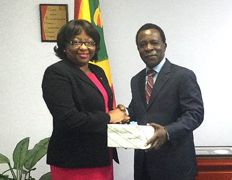 Grenada Prime Minister Keith Mitchell and Sr. Carisa Etienne