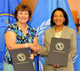 PAHO Director Dr. Mirta Roses (left) and Dr. Marsha Butler, Vice President of Colgate for Global Oral Care.