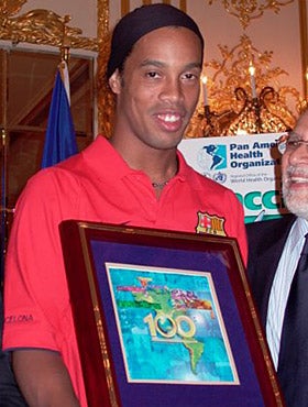 Ronaldinho receiving his Champions of Health award