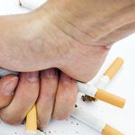 fist crushing cigarettes