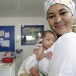 Nurse holding a newborn