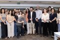 Equipe da BIREME reunida em São Paulo para celebrar os 59 anos do Centro com Sebastián García Saisó e João Paulo Souza, em 2 de março de 2026.
