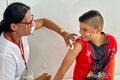 Boy receives vaccine