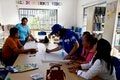 personas trabajando en reunion