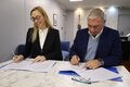 Foto de firma del acuerdo