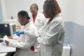 Assessment team in Grenada's laboratory