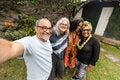 Selfie photo of four grown adults