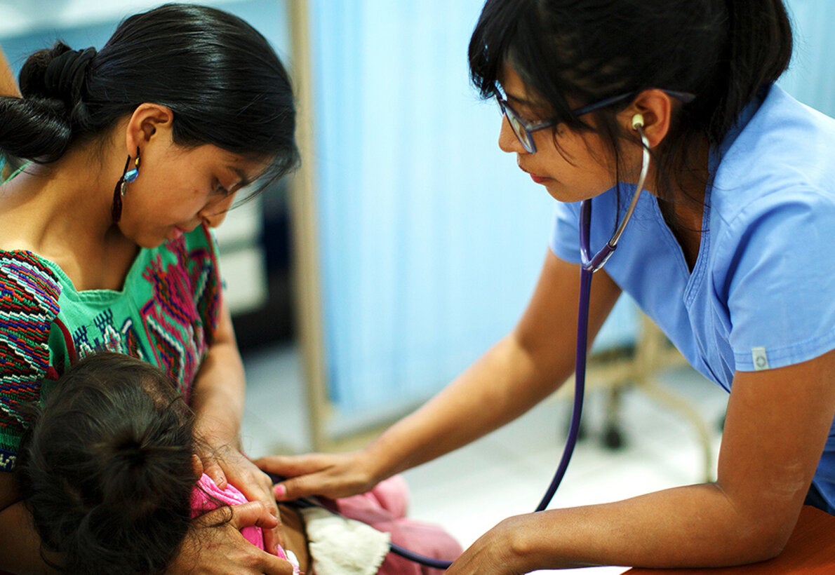 nurse checking child