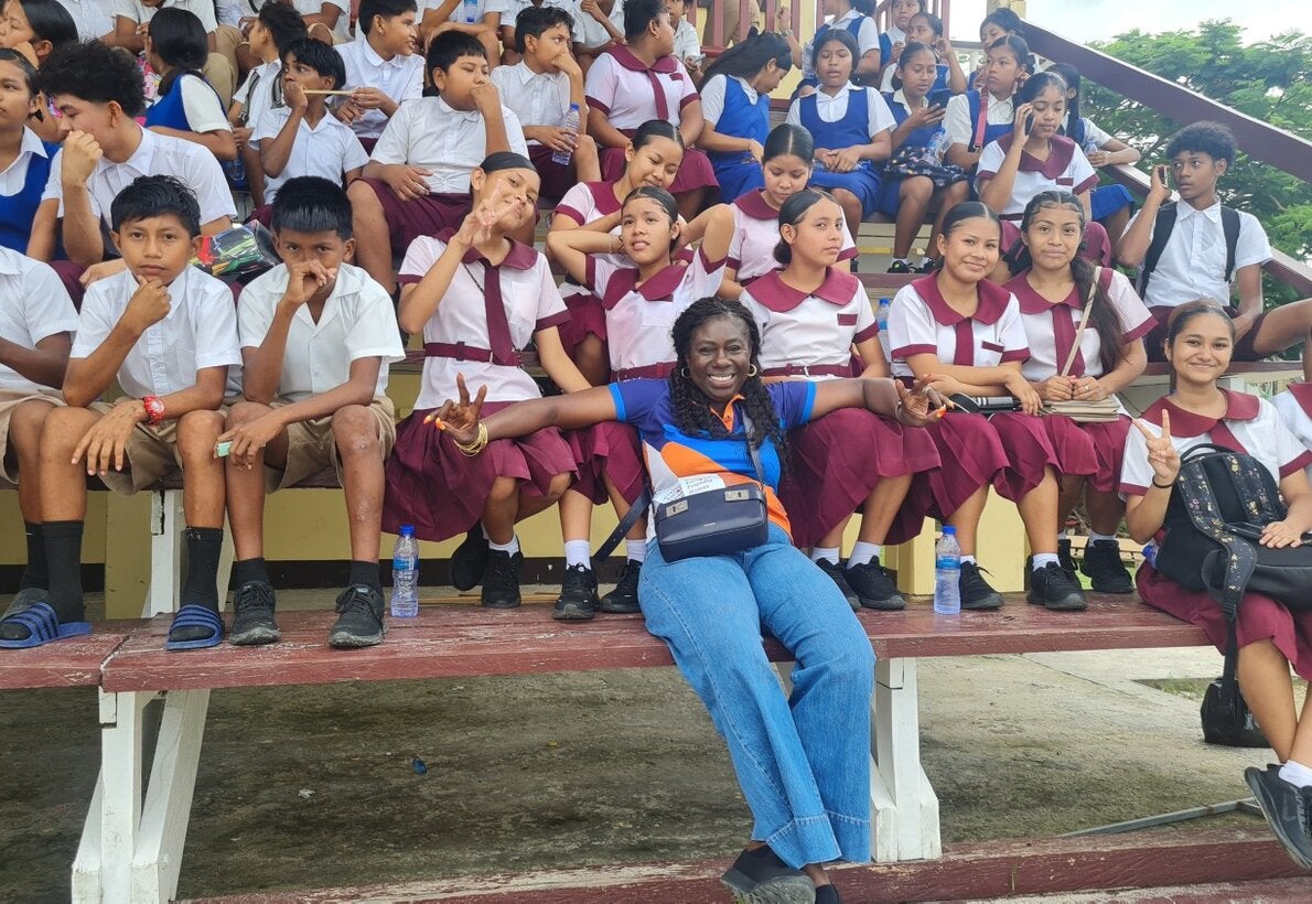 Dr. Kim Dickson chilling with the adolescent children of Bartica