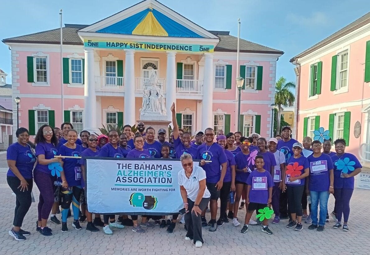 Participants of the Memory Walk pose in the front of the House of Assembly. Photo credit: The Bahamas Alzheimer's Association