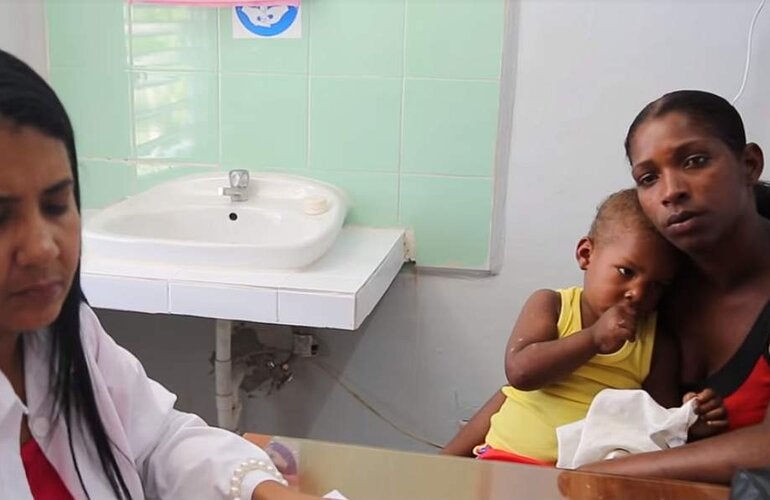 Mother and child in medical consultation