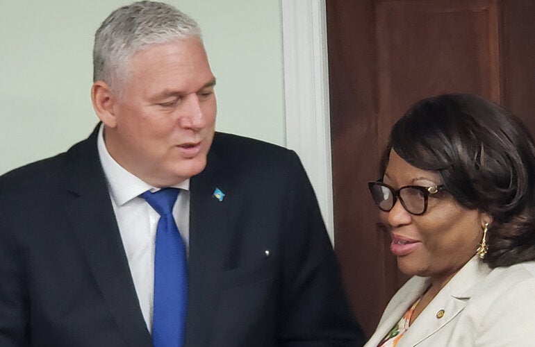 Prime Minister of St Lucia, Allen Chastanet with Dr. Carissa F. Etienne