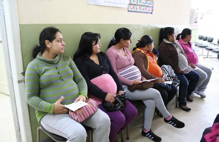 pregnant women await their appointment