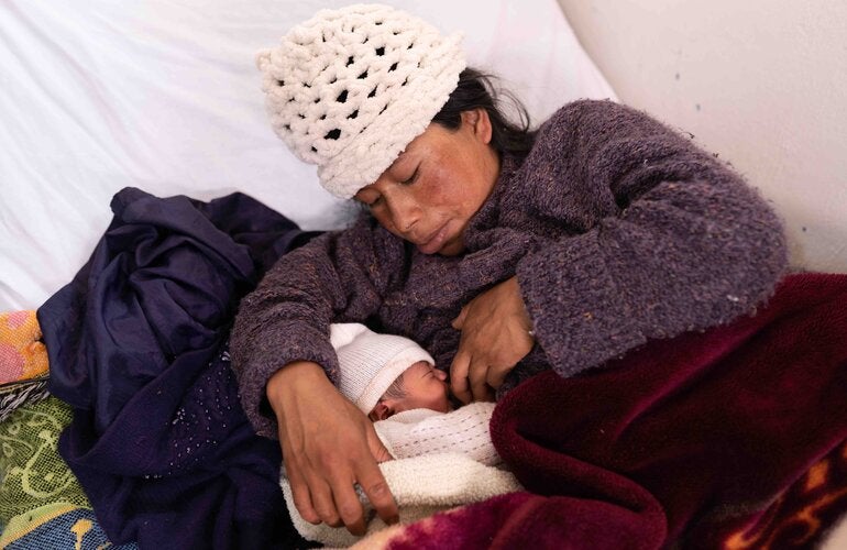 Guatemalan mother breastfeeds child