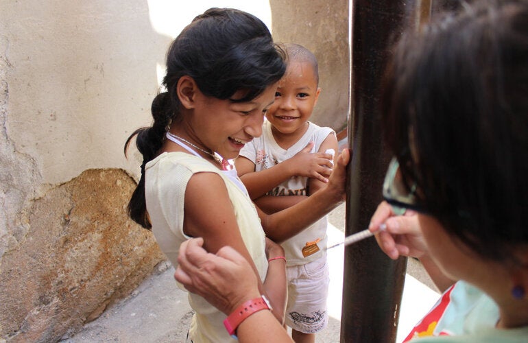 Child receives vaccine 
