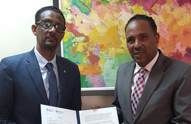 From left, Dr Yitades Gebre, PWR-ECC and Hon Dr Kenneth Darroux, Minister of Foreign Affairs