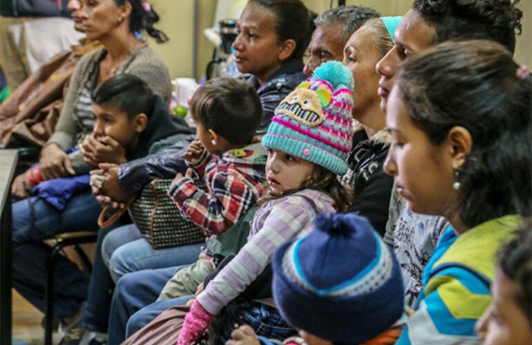 Mujeres migrantes en centro de salud 