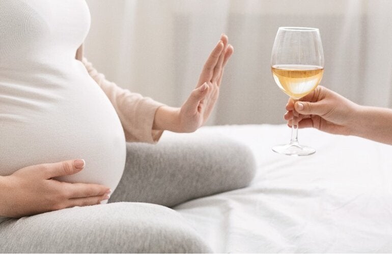 Pregnant woman refuses drinking alcohol