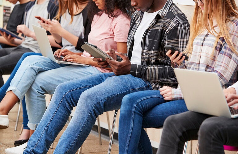 Young people on mobile devices