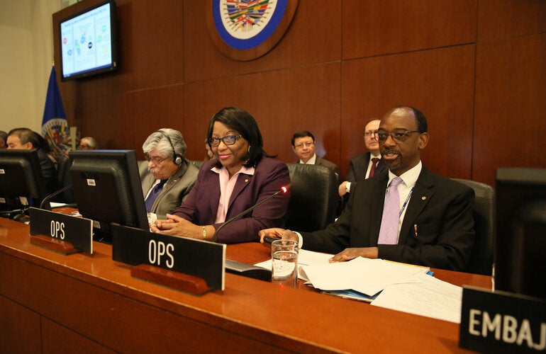 Dr Carissa Etienne and Dr Anselm Hennis