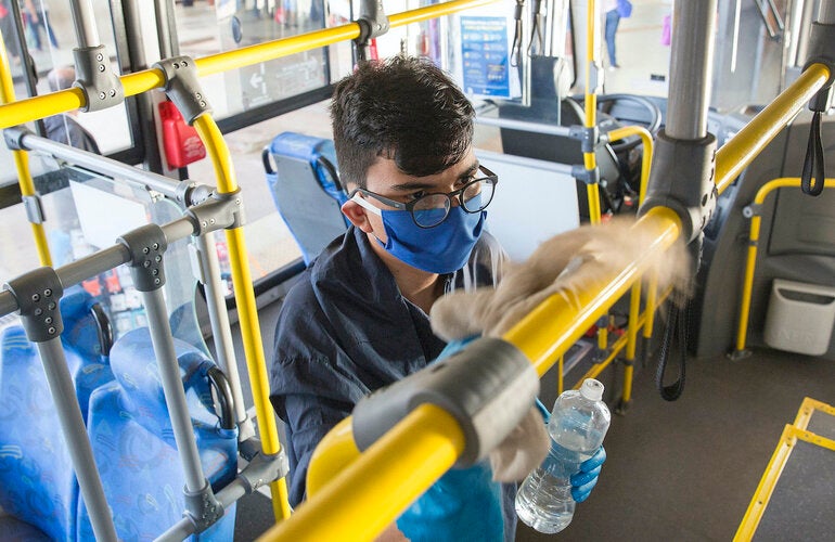 Young man riding the bus