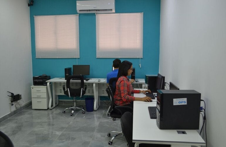 Personal en la unidad de registro de cáncer 