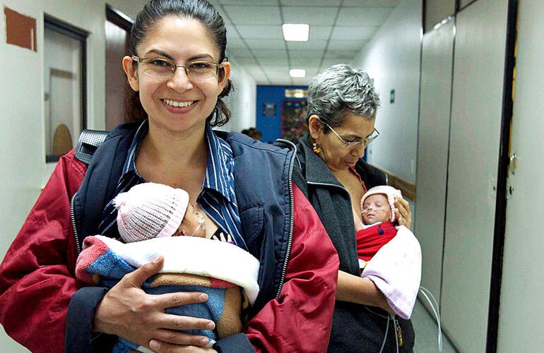 babies held kangaroo care