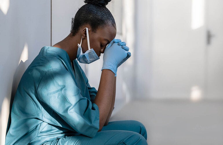 Exhausted health care worker