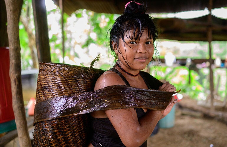 indigenous woman with basket