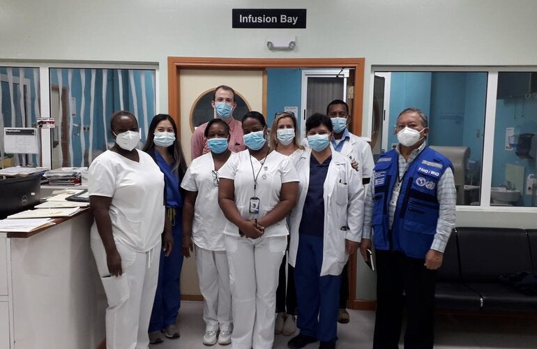 KHMH staff with PAHO/WHO Technical Advisor and Global Oncology Professional for cancer training